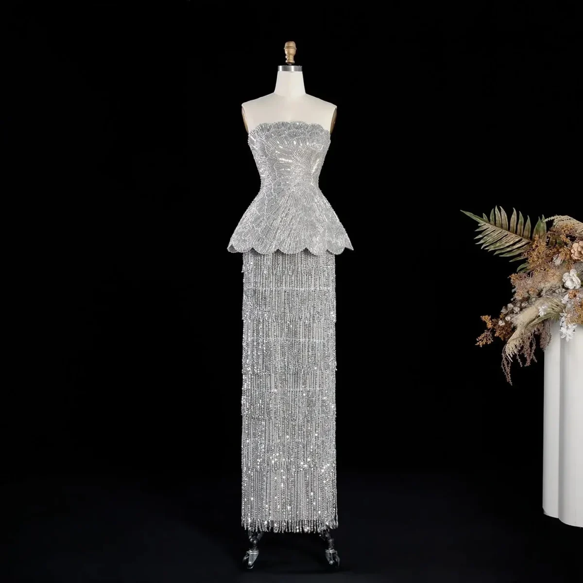 Elegant Gray Strapless Evening Dress with Scalloped Peplum Waist and Long Beaded Fringe
