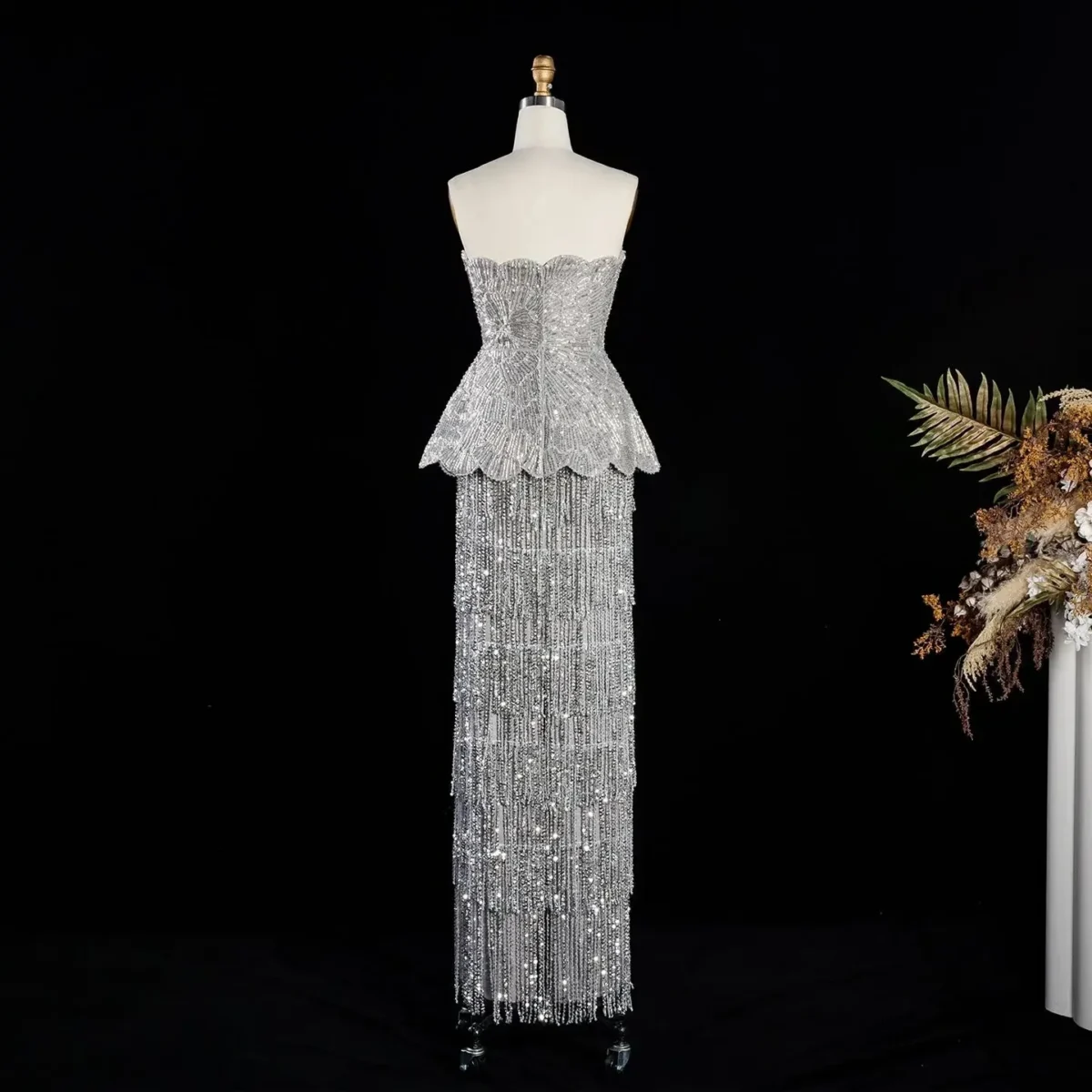 Elegant Gray Strapless Evening Dress with Scalloped Peplum Waist and Long Beaded Fringe