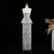 Elegant Gray Strapless Evening Dress with Scalloped Peplum Waist and Long Beaded Fringe