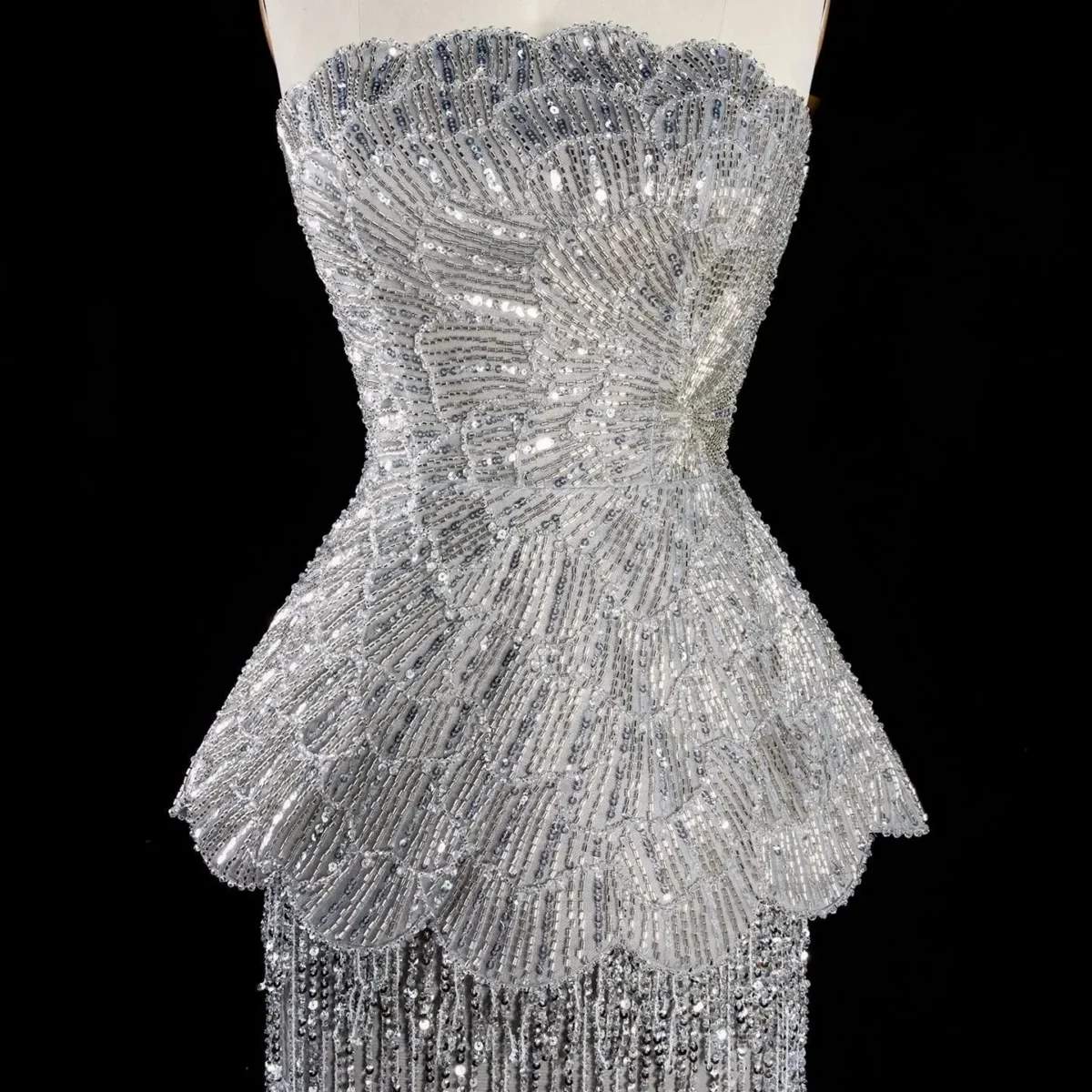 Elegant Gray Strapless Evening Dress with Scalloped Peplum Waist and Long Beaded Fringe