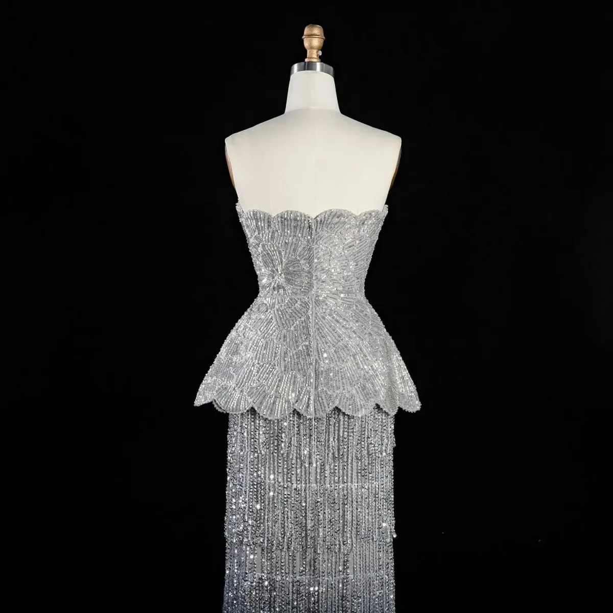 Elegant Gray Strapless Evening Dress with Scalloped Peplum Waist and Long Beaded Fringe