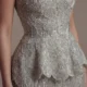 Elegant Gray Strapless Evening Dress with Scalloped Peplum Waist and Long Beaded Fringe