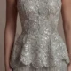 Elegant Gray Strapless Evening Dress with Scalloped Peplum Waist and Long Beaded Fringe