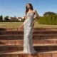 Elegant Gray Strapless Evening Dress with Scalloped Peplum Waist and Long Beaded Fringe