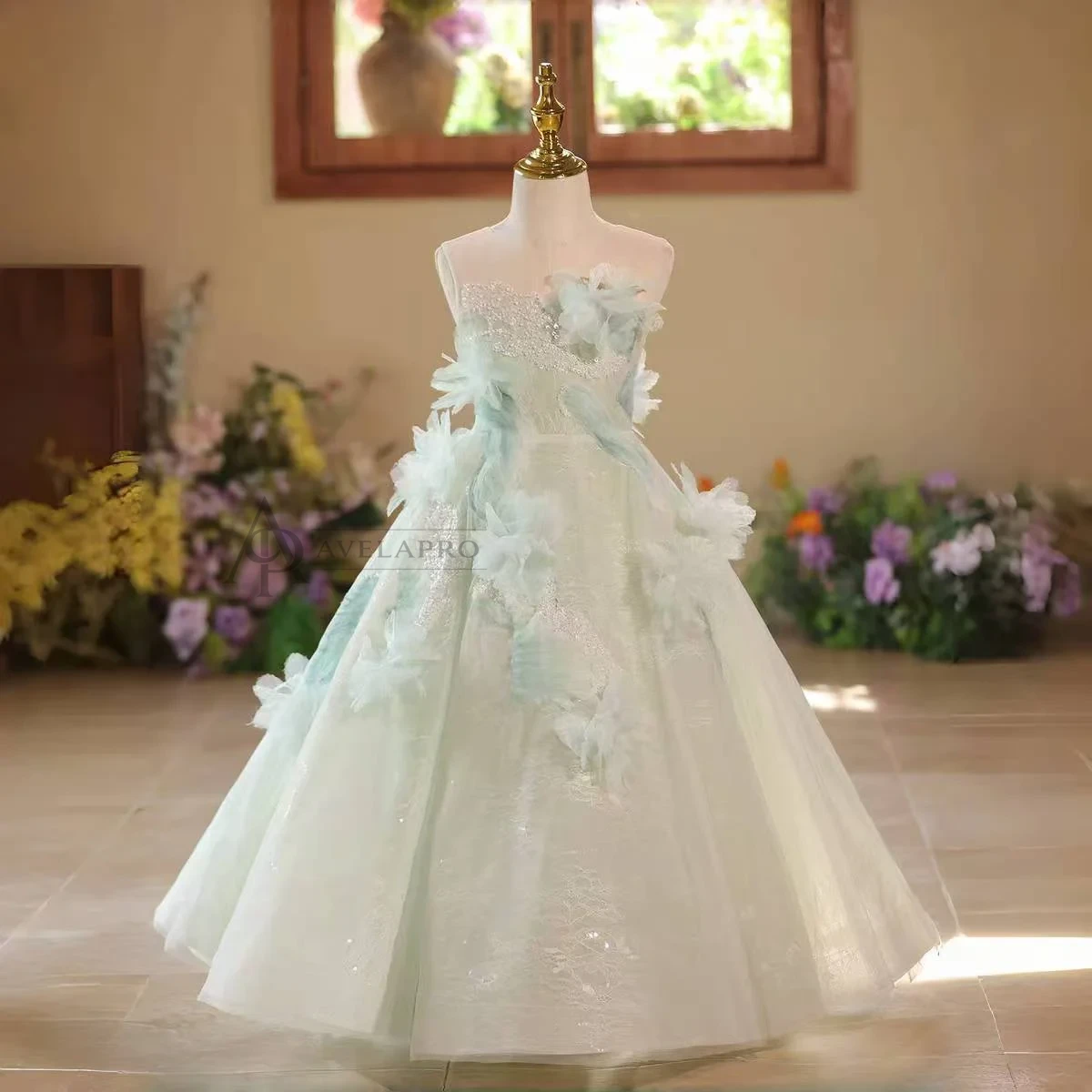 Elegant Mint Green Princess Dress with Floral Details and Sparkling Tulle