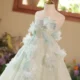 Elegant Mint Green Princess Dress with Floral Details and Sparkling Tulle