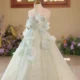 Elegant Mint Green Princess Dress with Floral Details and Sparkling Tulle