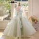 Elegant Mint Green Princess Dress with Floral Details and Sparkling Tulle