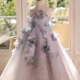 Elegant Mint Green Princess Dress with Floral Details and Sparkling Tulle