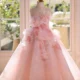 Elegant Mint Green Princess Dress with Floral Details and Sparkling Tulle